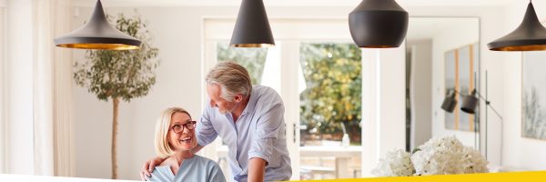 Influencer couple in modern living area, lighting control category feature